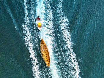 High angle view of man on boat sailing in sea