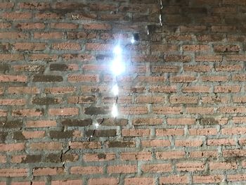 Low angle view of brick wall