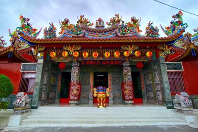 Exterior of temple building against sky