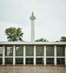 View of building against cloudy sky