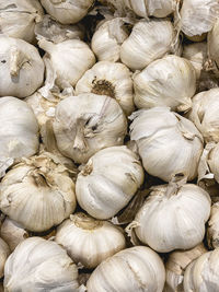 Full frame shot of onions for sale at market