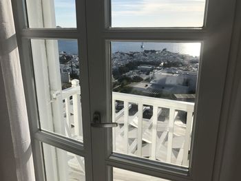 View of cityscape through window