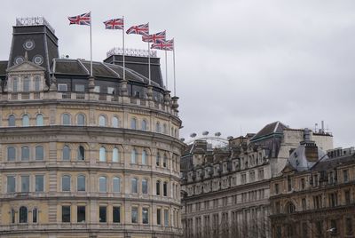 Low angle view of flag against sky
