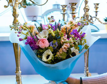 Close-up of purple flowers in vase on table