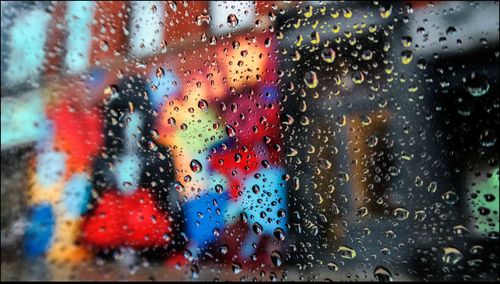 Close-up of water drops on glass