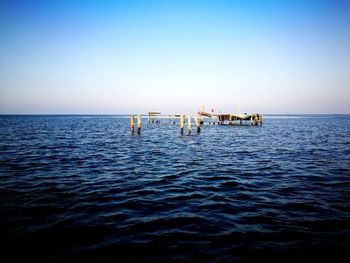 Scenic view of sea against clear sky