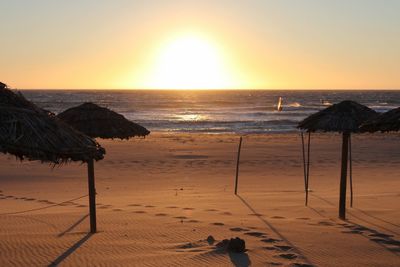 Scenic view of sea at sunset
