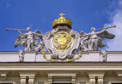 Low angle view of statue of historic building