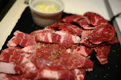 Close-up of served food on barbecue grill