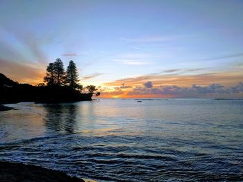 Scenic view of sea against sky during sunset