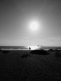 View of calm beach against sky