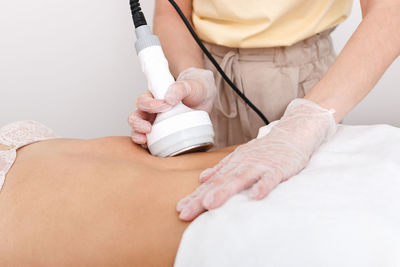 Midsection of woman working