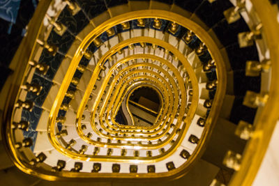 Directly below shot of spiral staircase in building