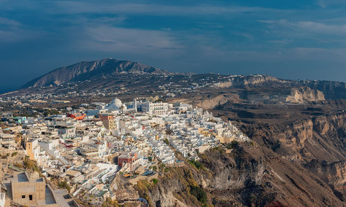 Aerial view of townscape against sky