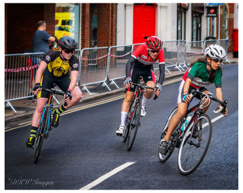 People riding bicycle