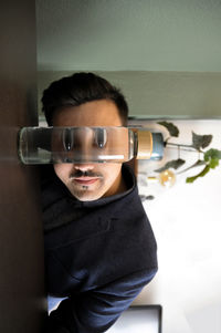 Portrait of young man with reflection