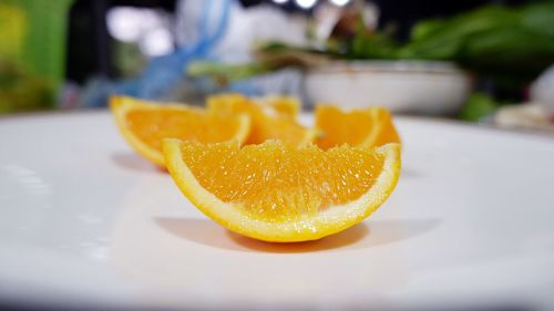 Close-up of orange fruit on table