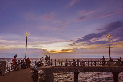 Scenic view of sea against sky at sunset