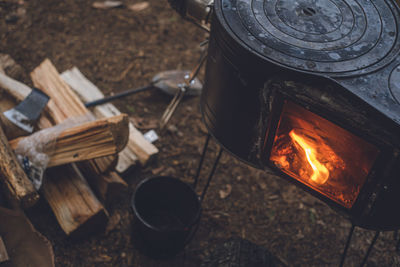 High angle view of bonfire on barbecue grill