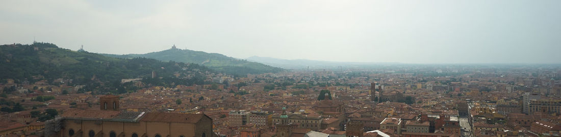 Aerial view of townscape against sky