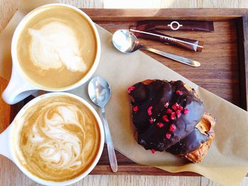 High angle view of coffee cup on table