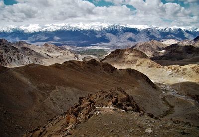 Scenic view of rocky mountains against sky