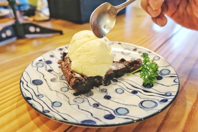 Close-up of ice cream served on table