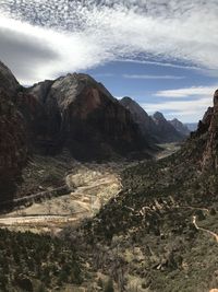 Scenic view of landscape and mountains against sky