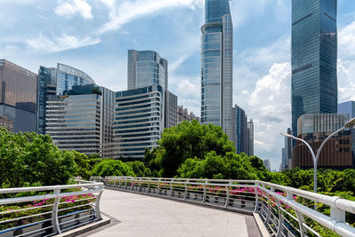 Modern buildings in city against sky