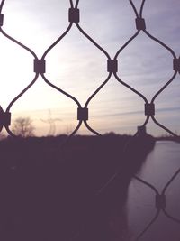 Chainlink fence against sky