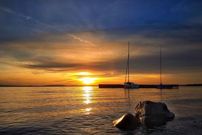 Scenic view of sea against sky during sunset
