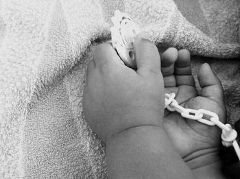 Close-up of woman holding hands