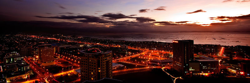 High angle view of illuminated city at night