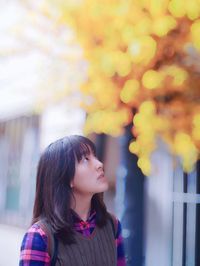 Thoughtful woman looking away outdoors