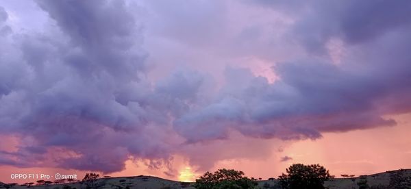 Low angle view of dramatic sky during sunset