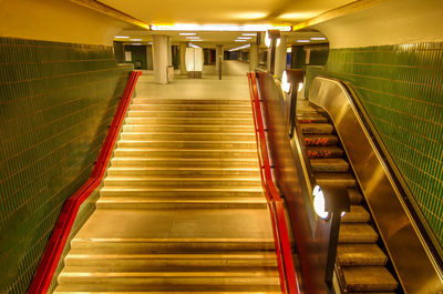 Interior of illuminated subway station