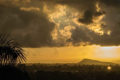 Scenic view of landscape against sky during sunset