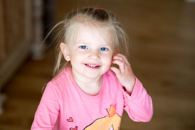 Close-up portrait of smiling girl