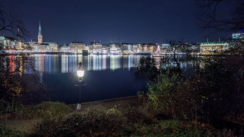 Illuminated buildings in city at night