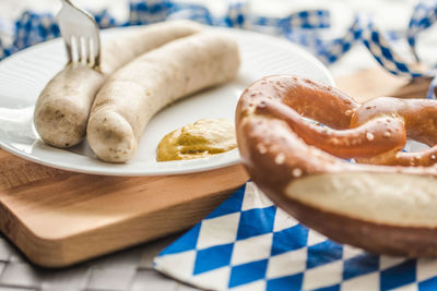 Close-up of bagel and hot dogs