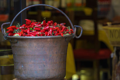 Red chili peppers in basket for sale