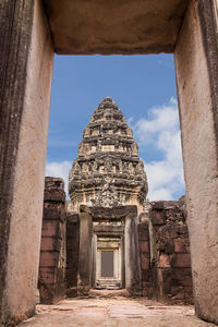 Low angle view of old temple against sky