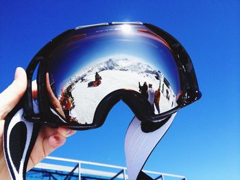 Skiing helmet against clear sky