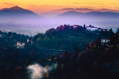 Scenic view of mountains against sky during sunset