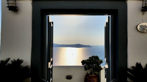 Scenic view of sea seen through window