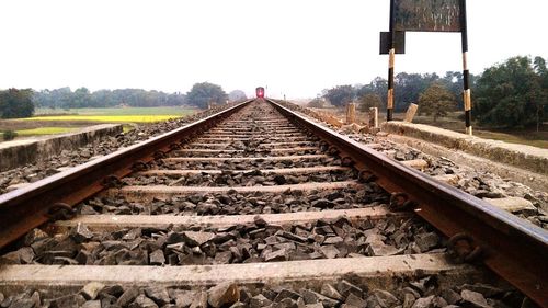 Railroad track against sky