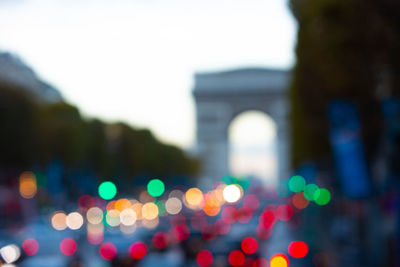Defocused image of city lit up at night