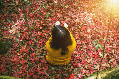 High angle view of woman standing on field