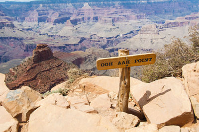 Information sign on rock formations in desert