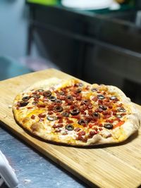 Close-up of pizza on cutting board